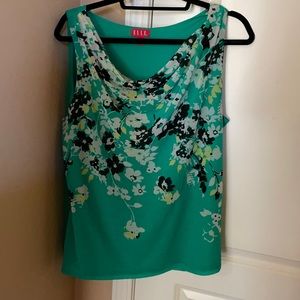 Woman’s layered scoop neck blouse